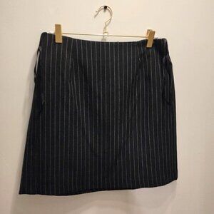 Alyn Paige straight black mini skirt zippered back